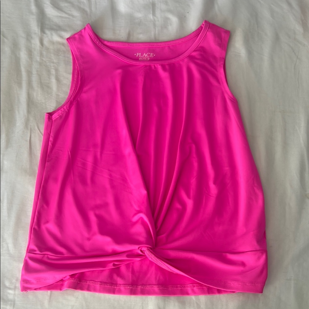 Place pink sleeveless top